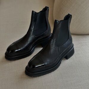 CHANEL Black Quilted Leather Chelsea Booties